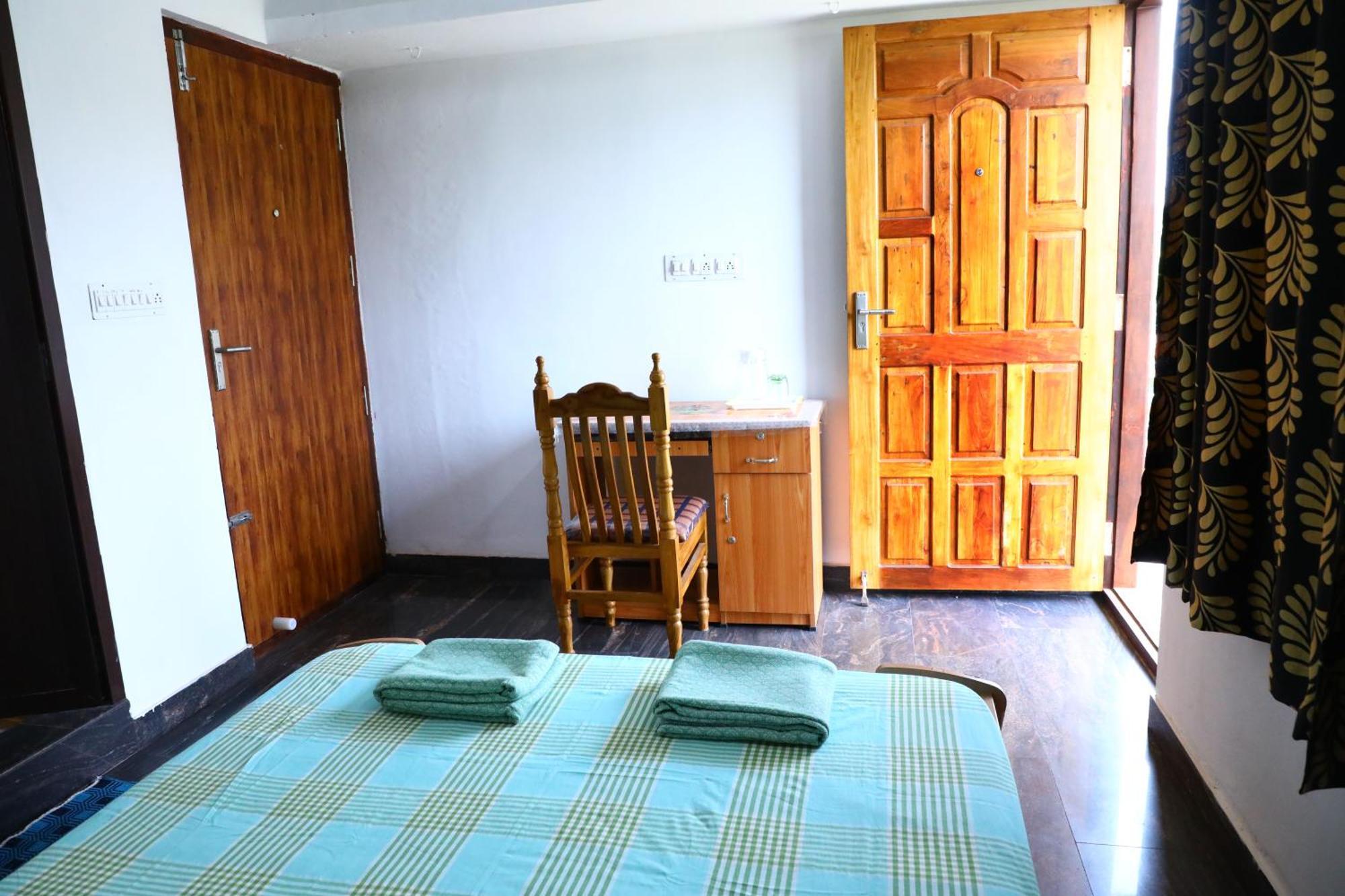 Cbr Ayurhealth Apartment Kannur Phòng bức ảnh