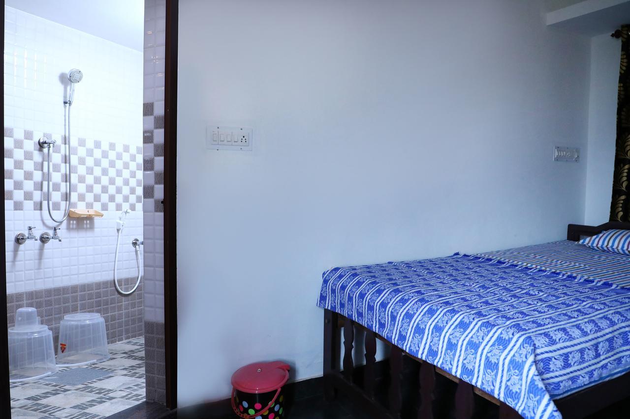 Cbr Ayurhealth Apartment Kannur Phòng bức ảnh